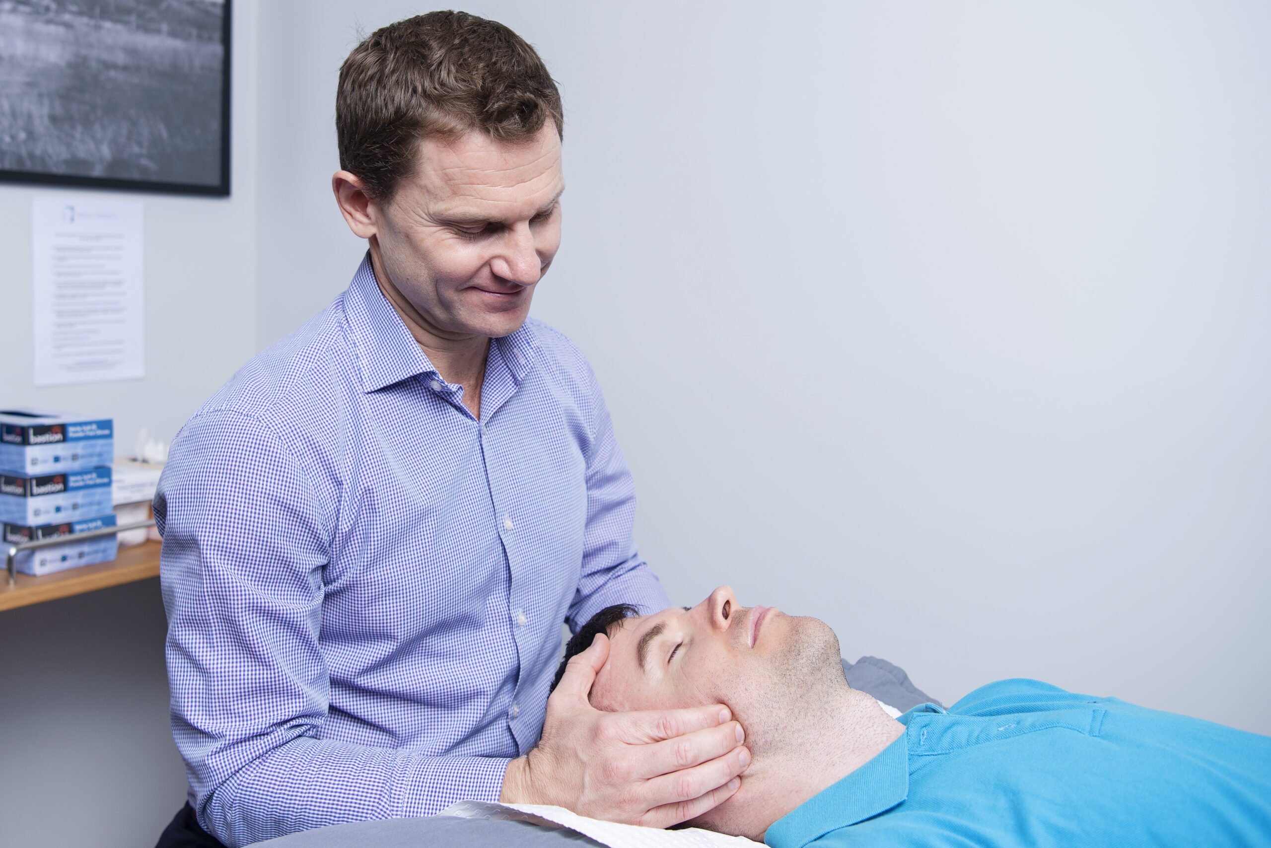 Physio treating TMJ symptoms