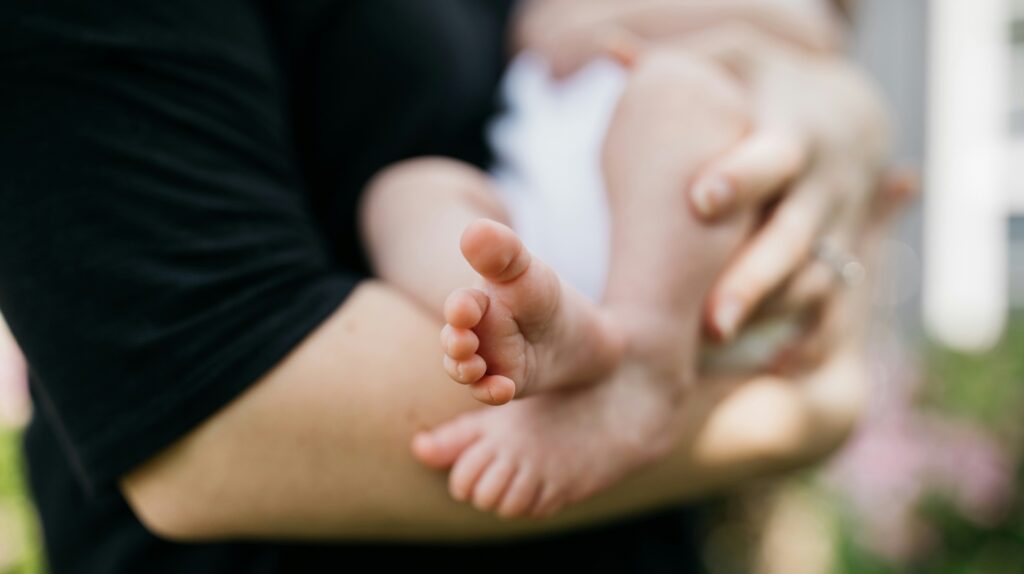 feet of baby being breastfed